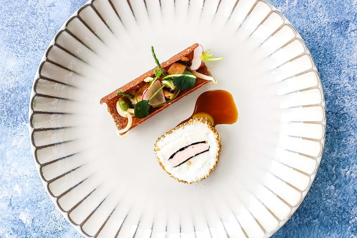 Twee gerechten + side naar keuze bij Merlin Seafood Bar