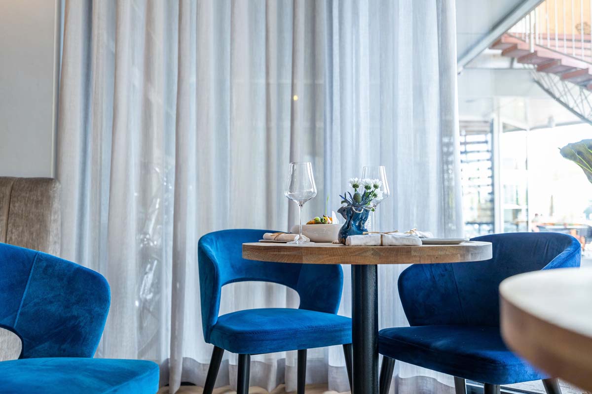 Twee gerechten + side naar keuze bij Merlin Seafood Bar