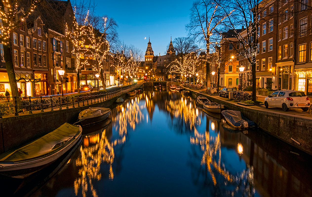 Historische tramrit door verlicht Amsterdam + drankje