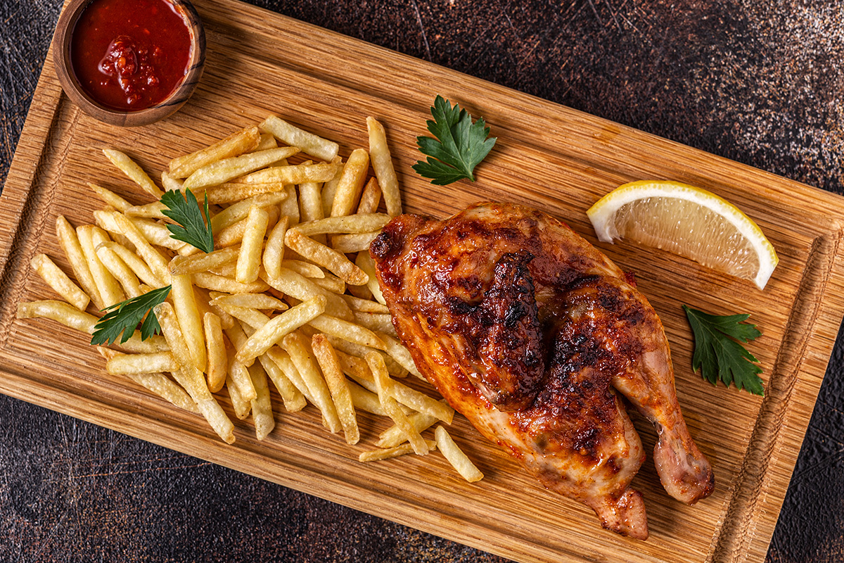 Onbeperkt schnitzels of kip eten + drankjes bij 't Perron Eten & Drinken