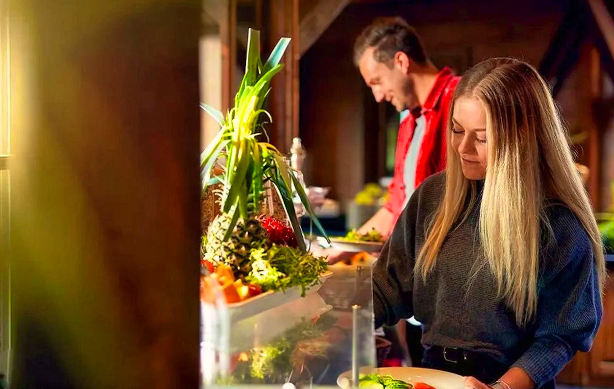 Hele dag skiën of snowboarden bij Alpincenter + onbeperkt buffet + drankjes