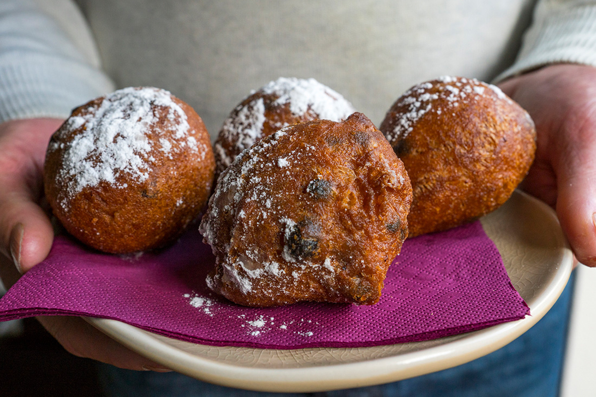 Zak met luxe olie-, krenten- of gemixte bollen (10 stuks)